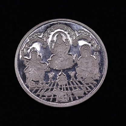 Solid silver Indian coin featuring Lord Ganesha, Lakshmi, and Saraswati print, 20 grams, collectible coin by Tribal Ornaments.