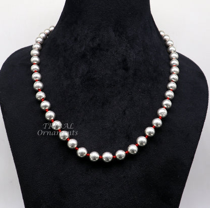 Sterling silver 9mm wax beaded tribal necklace by TRIBAL ORNAMENTS, featuring custom cultural design for brides and gift sets.