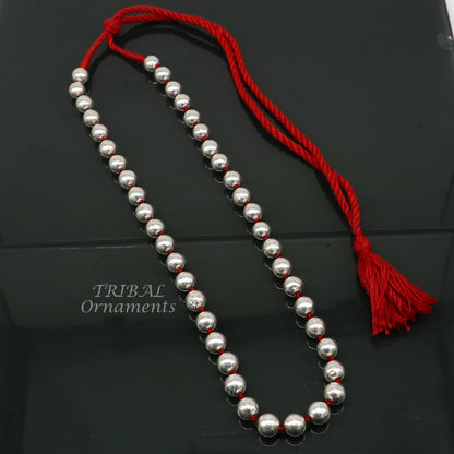 Sterling silver 9mm wax beaded tribal necklace by TRIBAL ORNAMENTS, featuring colorful cultural beads for brides and tribal jewelry.