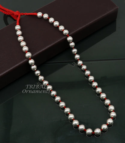 Sterling silver 9mm wax beaded tribal necklace by TRIBAL ORNAMENTS, featuring colorful cultural bead design for brides and special occasions.