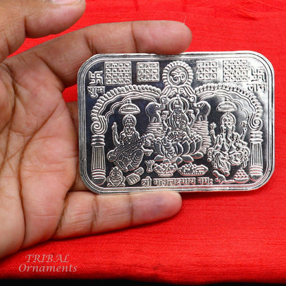 Handmade 9x6.3 cm 925 sterling silver Shree Lakshmi Ganesha Saraswati frame, a divine symbol for wealth and prosperity.