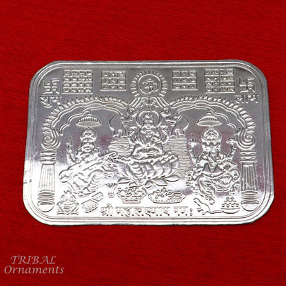 Handmade 9x6.3 cm sterling silver Shree Lakshmi, Ganesha, and Saraswati divine frame for wealth and prosperity, by TRIBAL ORNAMENTS.