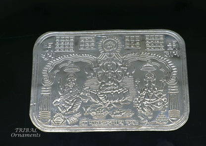 Handmade 925 sterling silver Shree Lakshmi, Ganesha, and Saraswati divine frame for wealth and prosperity, crafted by Tribal Ornaments.