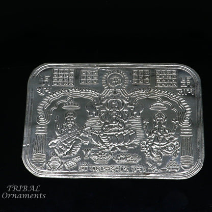 Handmade 925 sterling silver Shree Lakshmi, Ganesha, and Saraswati divine frame for wealth and prosperity, 9x6.3 cm from TRIBAL ORNAMENTS.