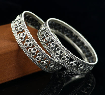 925 sterling silver flower design bangle bracelet by TRIBAL ORNAMENTS, featuring intricate tribal and ethnic jewelry craftsmanship.