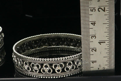 925 sterling silver flower design bangle bracelet by TRIBAL ORNAMENTS, showcasing intricate tribal and ethnic jewelry craftsmanship.