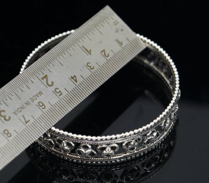 925 sterling silver flower design bangle bracelet by TRIBAL ORNAMENTS, showcasing intricate tribal and ethnic jewelry craftsmanship.