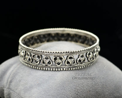925 sterling silver flower design bangle bracelet from TRIBAL ORNAMENTS, featuring intricate tribal and ethnic jewelry style.