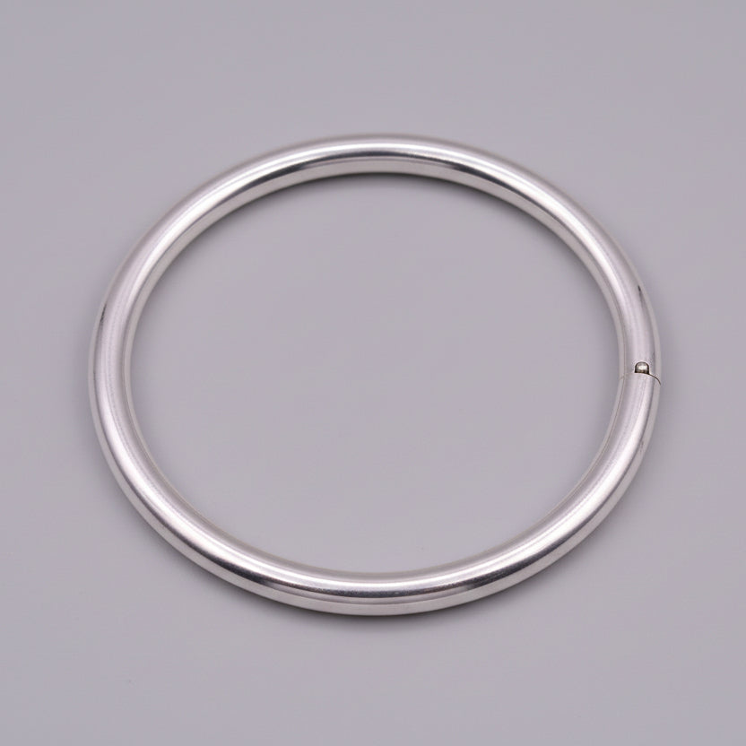Bright shining 925 sterling silver unisex round bangle bracelet from Tribal Ornaments, handmade jewelry perfect for gifting.