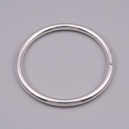 Bright shining 925 sterling silver unisex round bangle bracelet from Tribal Ornaments, handmade jewelry perfect for gifting.