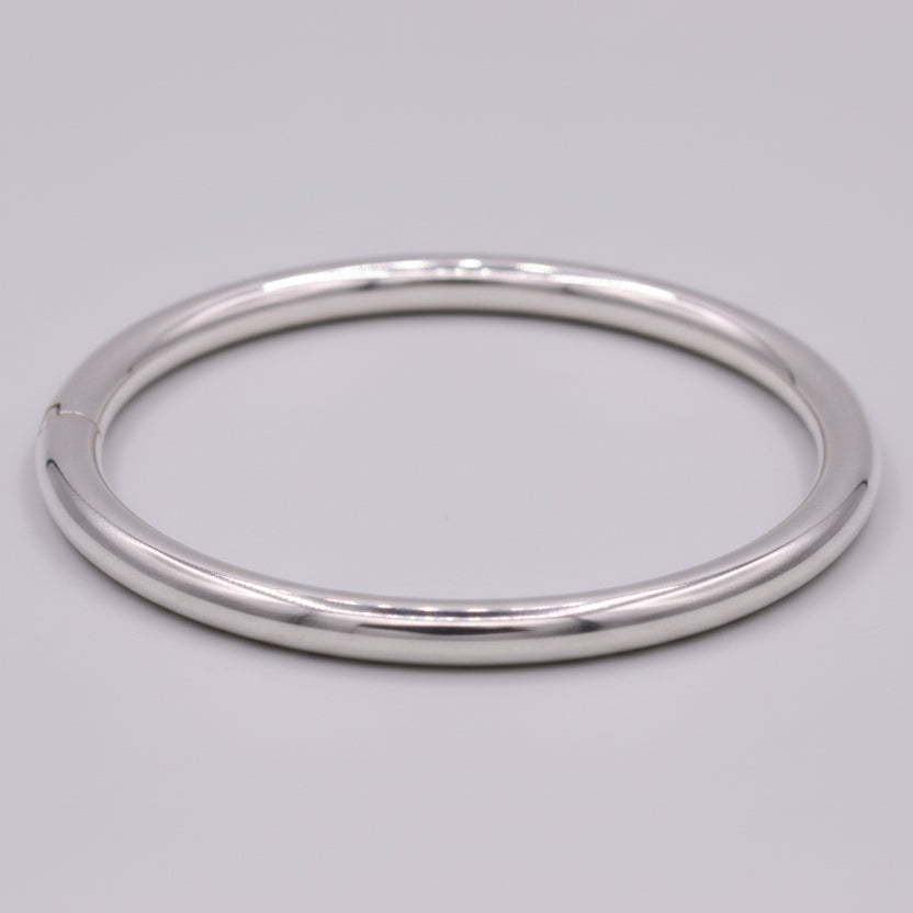 925 sterling silver unisex round bangle bracelet with bright shine, handmade tribal jewelry, ideal for gifting from Tribal Ornaments