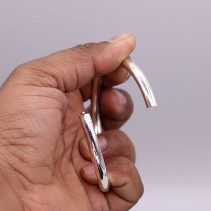 Bright shining 925 sterling silver round unisex bangle bracelet with intricate tribal design, ideal for gifting or stylish wear.