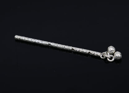 Handmade sterling silver Krishna flute idol with detailed design, featuring traditional puja art and crafted by TRIBAL ORNAMENTS.