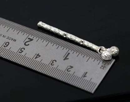 Solid sterling silver handmade Krishna flute idol by TRIBAL ORNAMENTS, featuring a detailed little Krishna with a silver bansuri for puja.