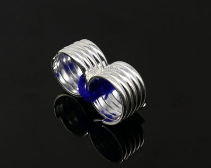 Handmade solid silver toe rings with spiral design, tribal-inspired boho jewelry perfect for belly dance and hippie fashion.