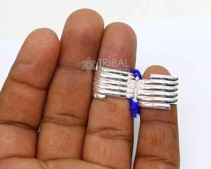 Pair of handmade tribal silver toe rings with spiral design, perfect for boho, hippie, and belly dance jewelry styles.