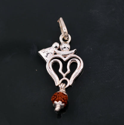 Solid silver Lord Shiva trident pendant with real Rudraksha beads, unisex tribal jewelry from Rajasthan by TRIBAL ORNAMENTS.