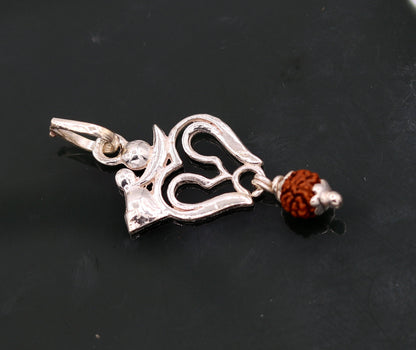 Silver Lord Shiva trident pendant with real Rudraksha beads, unisex tribal jewelry from Rajasthan by TRIBAL ORNAMENTS.