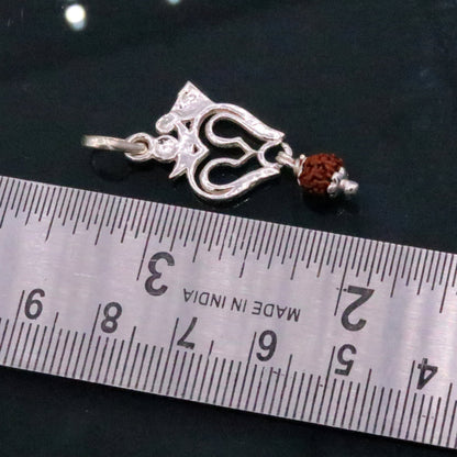 Solid silver Lord Shiva trident pendant with real Rudraksha beads, unisex tribal jewelry from Rajasthan by TRIBAL ORNAMENTS.