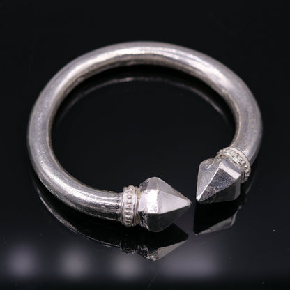 Solid silver open face adjustable bangle bracelet with bright tribal design, unisex jewelry from TRIBAL ORNAMENTS.