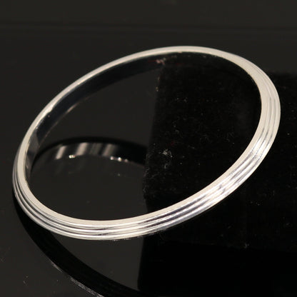 Solid silver Punjabi Sikkha kada bangle bracelet by TRIBAL ORNAMENTS, unisex, customized, personalized jewelry for daily wear.
