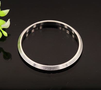 Solid silver Punjabi Sikkha kada bangle bracelet by Tribal Ornaments, personalized unisex jewelry with intricate design details.