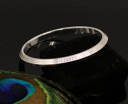 Tribal Ornaments solid silver Punjabi Sikkha Kada bangle bracelet, unisex jewelry with intricate design, customizable and suitable for daily wear.