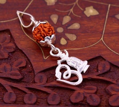 Sterling silver Aum mantra pendant with natural rudraksha beads, lightweight unisex jewelry, crafted by TRIBAL ORNAMENTS.