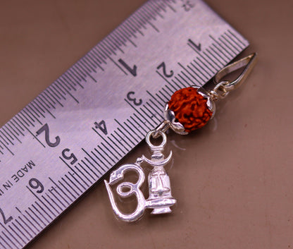 Sterling silver Aum mantra pendant with natural Rudraksha beads, lightweight unisex jewelry from Tribal Ornaments.