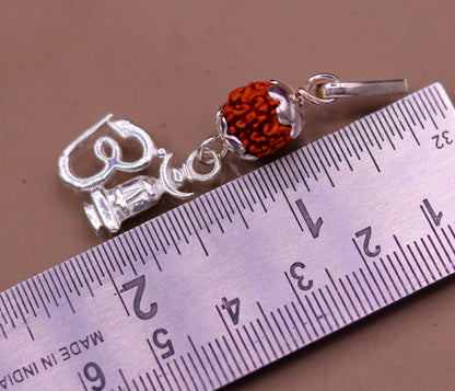 Sterling silver Aum mantra pendant with natural rudraksha beads, lightweight unisex jewelry from Tribal Ornaments.