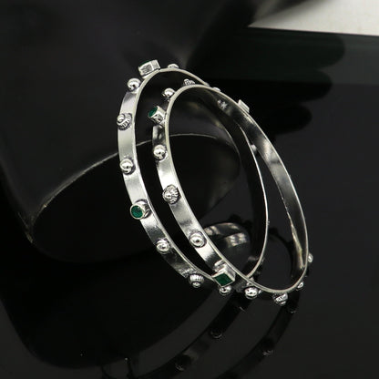 Sterling silver tribal-style green gemstone bangle bracelet with plain design, handmade jewelry by Tribal Ornaments.