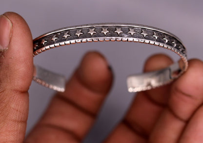 Vintage 925 sterling silver cuff bangle bracelet by TRIBAL ORNAMENTS, adjustable unisex kada with intricate antique design.