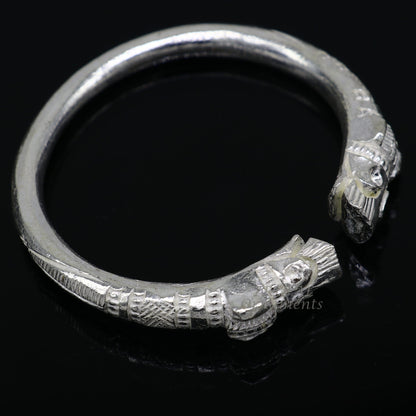 Solid silver crocodile design bangle cuff bracelet by Tribal Ornaments, unisex jewelry with adjustable fit, vintage style.