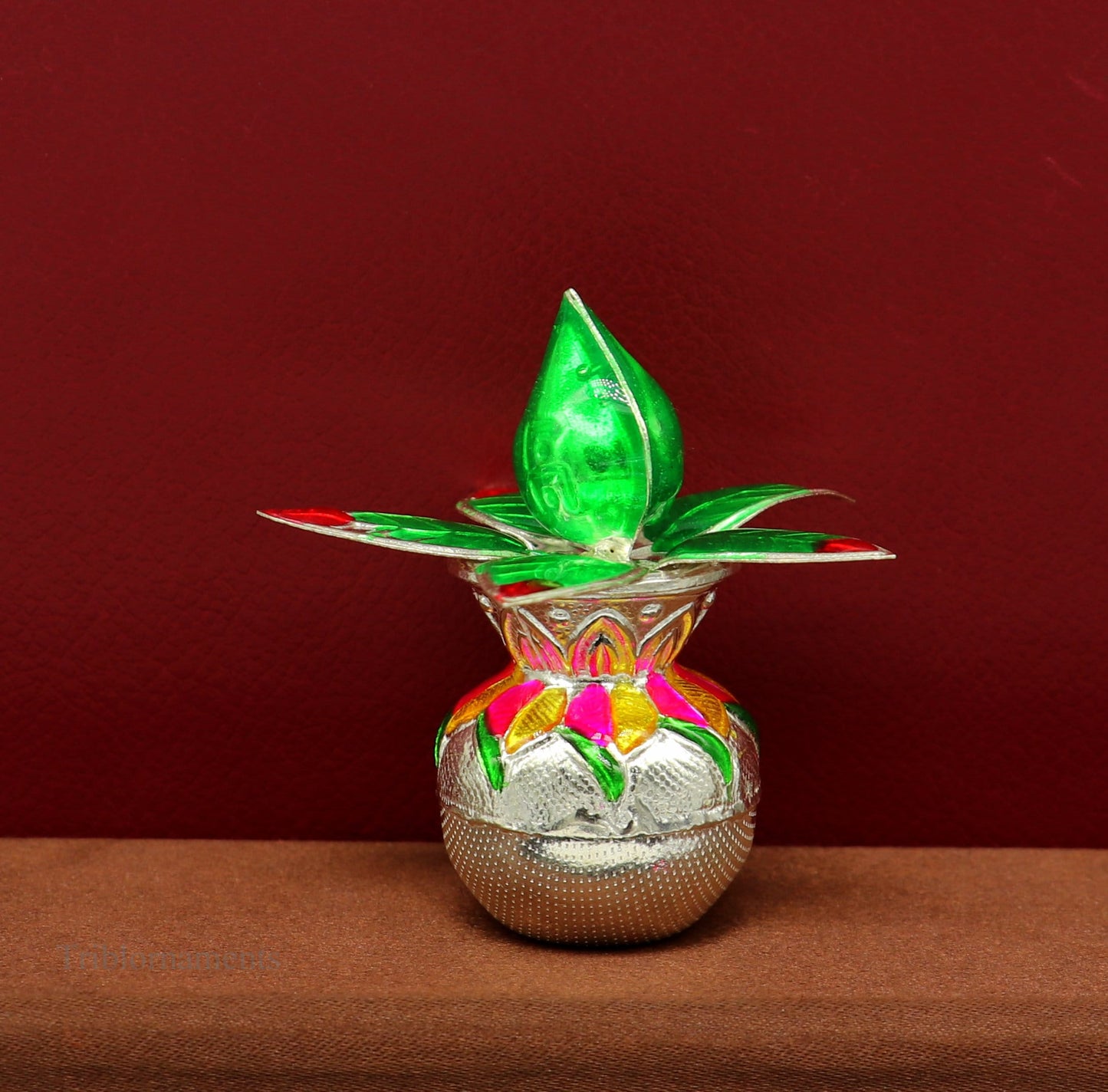 Handmade sterling silver puja kalash with leaf design from Tribal Ornaments, ideal for home temple worship and puja rituals.