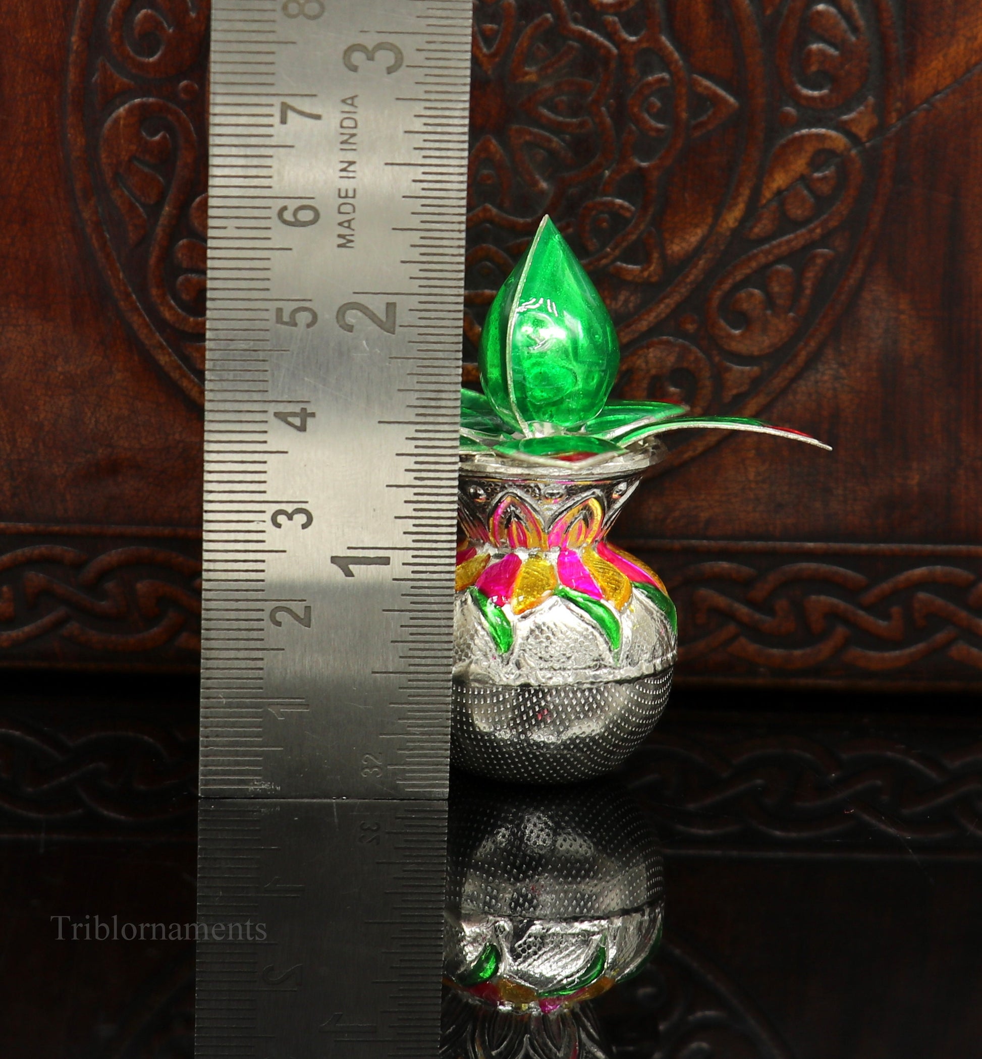 Handmade sterling silver puja kalash with leaf design for home temple worship, crafted by Tribal Ornaments.