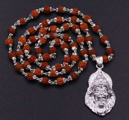 Handmade 925 sterling silver Lord Vishnu Avtar Narishma pendant with natural Rudraksha beads in a tribal jewelry necklace set.