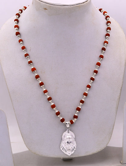 Handmade 925 sterling silver Lord Vishnu Avtar Narishma pendant with natural Rudraksha beads in a tribal jewelry set.