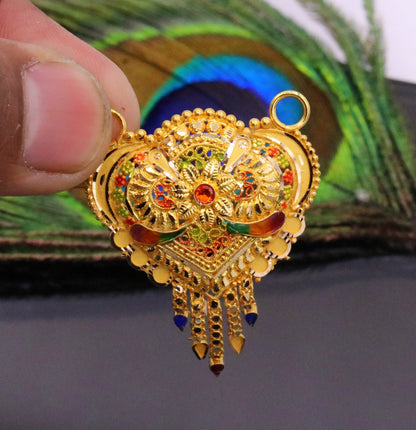 Authentic 22KT yellow gold Indian tribal pendant with intricate filigree work, hallmarked 916, showcasing traditional craftsmanship.