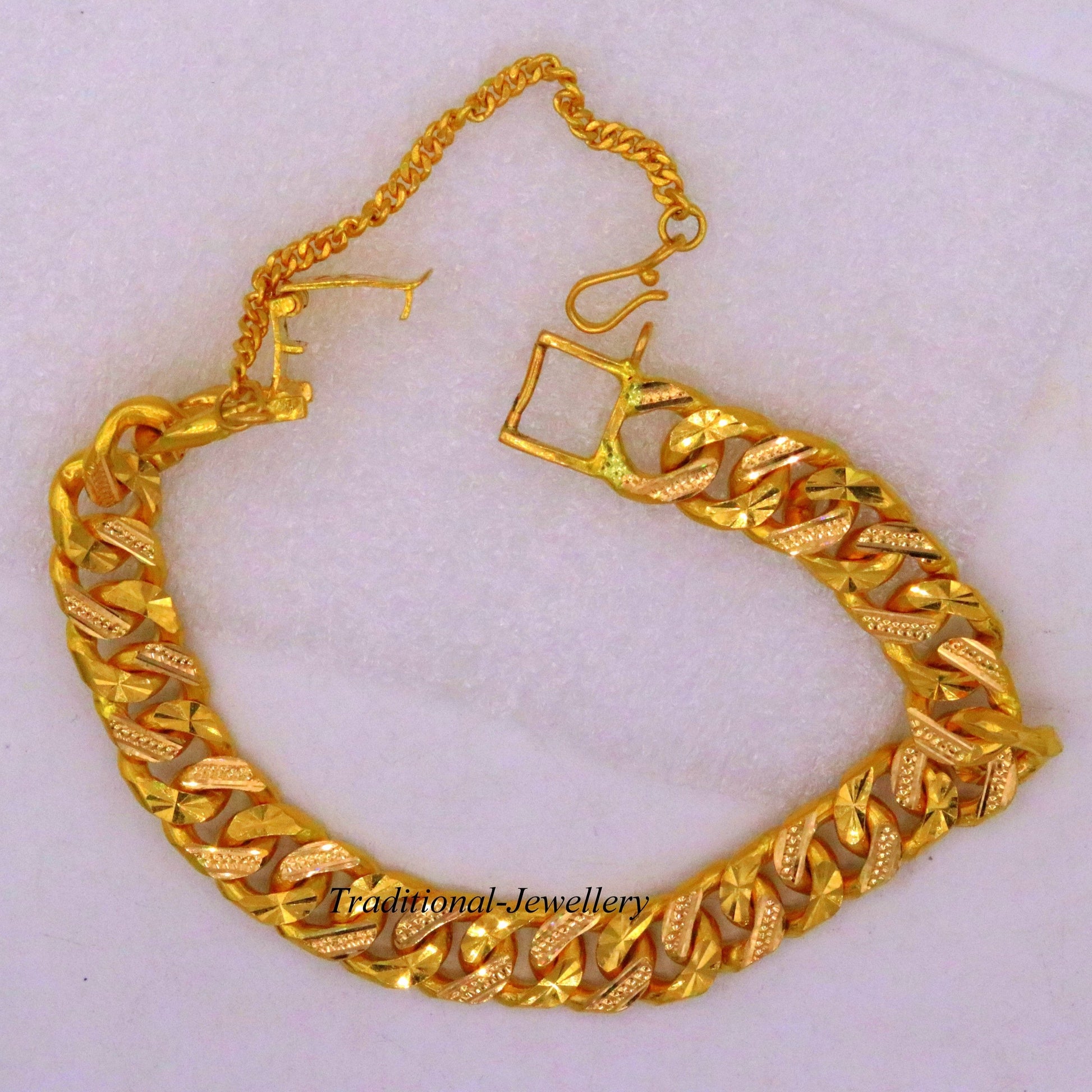 Authentic 22kt yellow gold Cuban link bracelet with diamond-cut design, handmade men's jewelry by Tribal Ornaments.