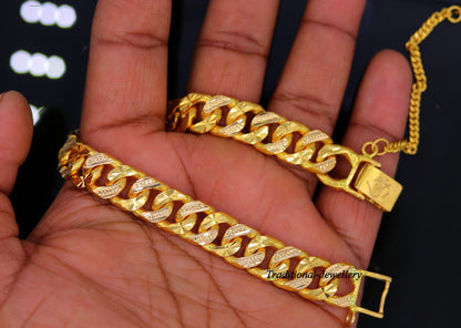 Authentic 22kt yellow gold Cuban link bracelet with diamond-cut design, handmade men's jewelry by TRIBAL ORNAMENTS.
