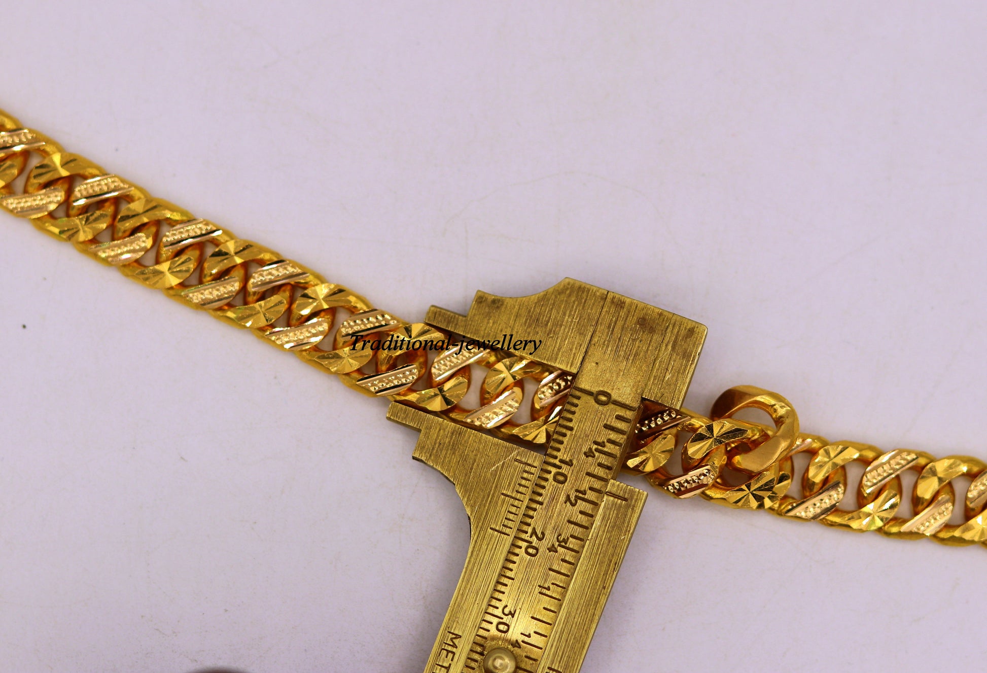 Authentic 22kt yellow gold handmade Cuban link bracelet with diamond-cut design, solid gold men's jewelry from TRIBAL ORNAMENTS.