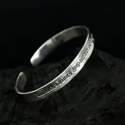 Sterling silver Gayatri Mantra cuff bracelet by Tribal Ornaments, unisex jewelry with adjustable design and engraved mantra detail.