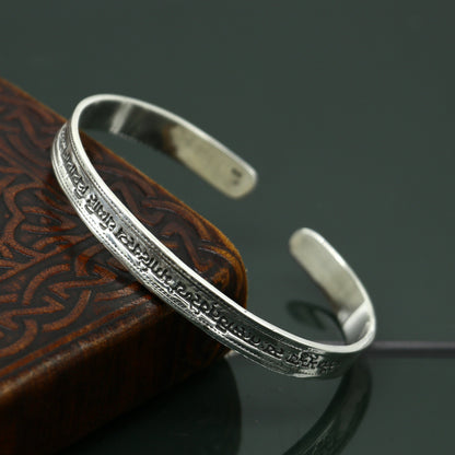925 sterling silver Gayatri Mantra cuff bracelet by TRIBAL ORNAMENTS, unisex jewelry with adjustable design and intricate mantra engraving.