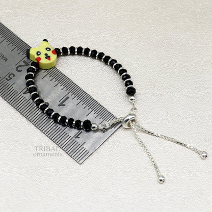 Handmade black beaded baby bangle or ankle bracelet in 925 sterling silver, customized kids jewelry by TRIBAL ORNAMENTS.