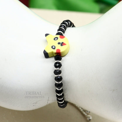 Handmade black beaded baby bracelet or ankle bracelet made of 925 sterling silver, customized kids jewelry by Tribal Ornaments.