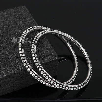 925 sterling silver bangle bracelet by TRIBAL ORNAMENTS featuring intricate silver ball work and tribal wedding jewelry design