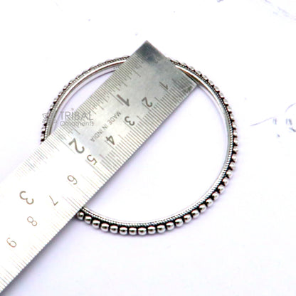 925 sterling silver tribal bangle bracelet featuring intricate silver ball work and elegant design for tribal wedding jewelry.