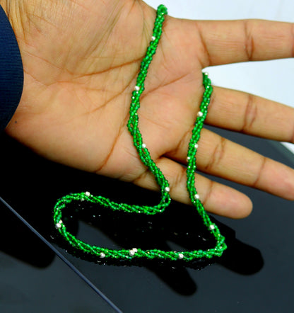 Custom galaxy necklace by TRIBAL ORNAMENTS featuring silver semi-precious green beads and triple silver strands.