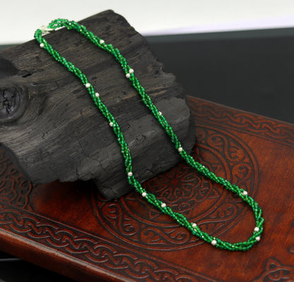 Custom galaxy necklace by TRIBAL ORNAMENTS featuring triple strands with silver semi-precious green beads and 925 pure silver.