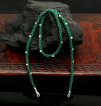 Custom made triple-strand necklace with green semi-precious beads and 925 silver beads, featuring a galaxy-inspired design.